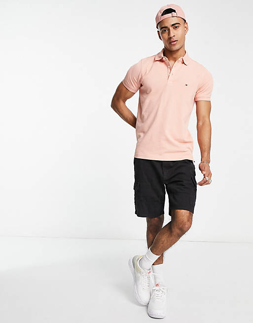 Tommy Hilfiger 1985 icon logo slim fit pique polo in pink | ASOS