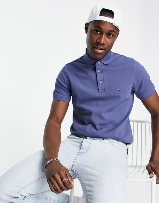 https://images.asos-media.com/products/tommy-hilfiger-1985-icon-logo-slim-fit-pique-polo-shirt-in-dark-blue/202423450-1-darkblue?$n_550w$&wid=550&fit=constrain