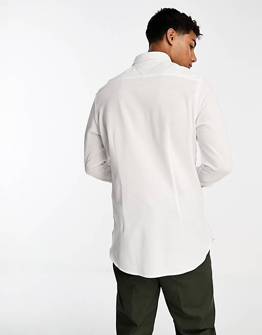 Tommy Hilfiger 1985 knitted slim fit shirt in optic white | ASOS