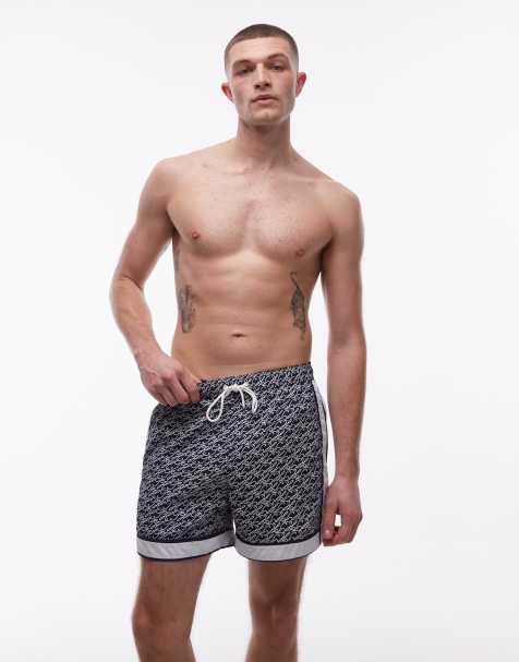 Tommy Hilfiger allover print drawstring swim shorts in navy - view 1