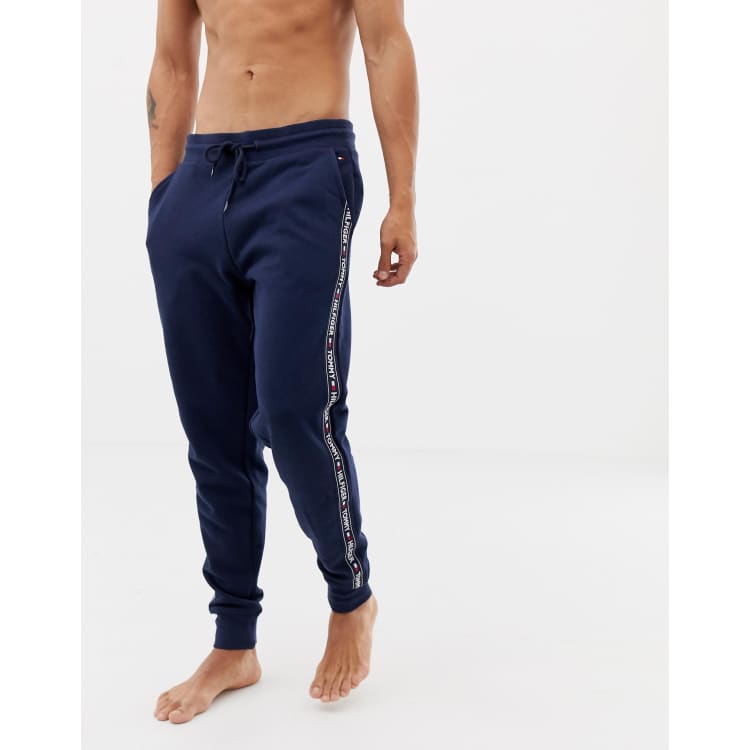 Tommy Hilfiger authentic cuffed lounge joggers with side logo taping in navy ASOS