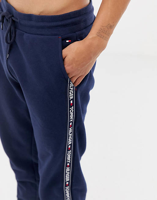 Tommy Hilfiger authentic cuffed lounge sweatpants with side logo taping in  navy | ASOS