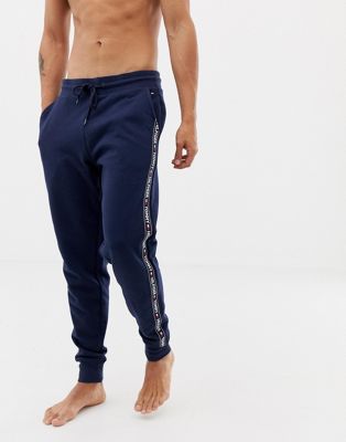 Tommy Hilfiger authentic cuffed lounge joggers with side logo taping in navy - ASOS Price Checker