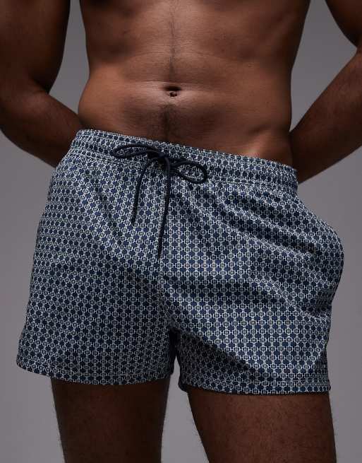 Tommy Hilfiger – Badeshorts mit Kordelzug und blauem geometrischem Muster, 4 von 5