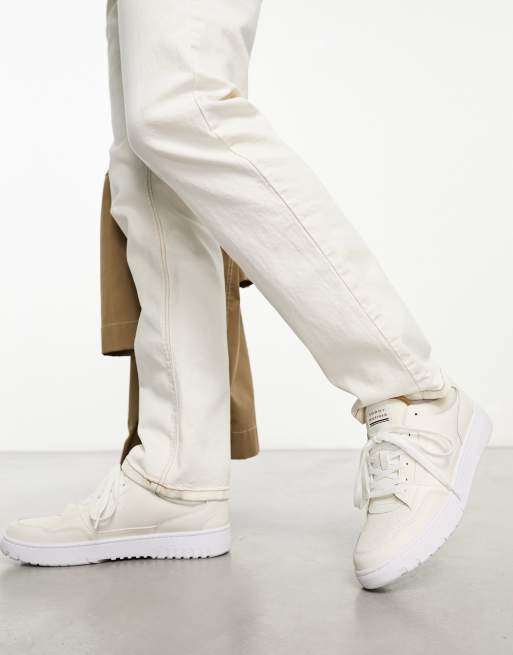Tommy Hilfiger - Basket Core - Leren sneakers in gebroken wit