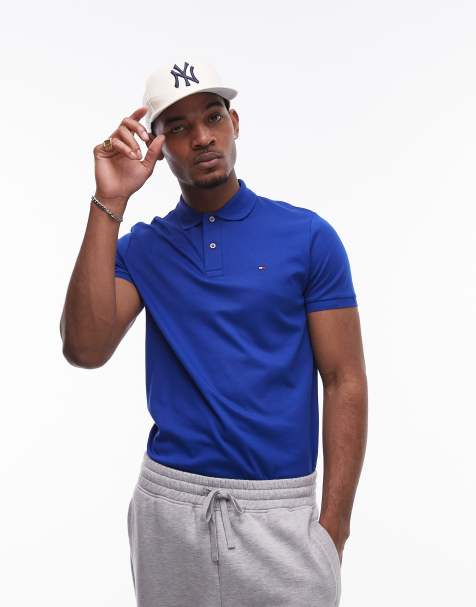Tommy Hilfiger – Baumwoll-Polohemd in leuchtendem Blau mit normalem Schnitt - view 1