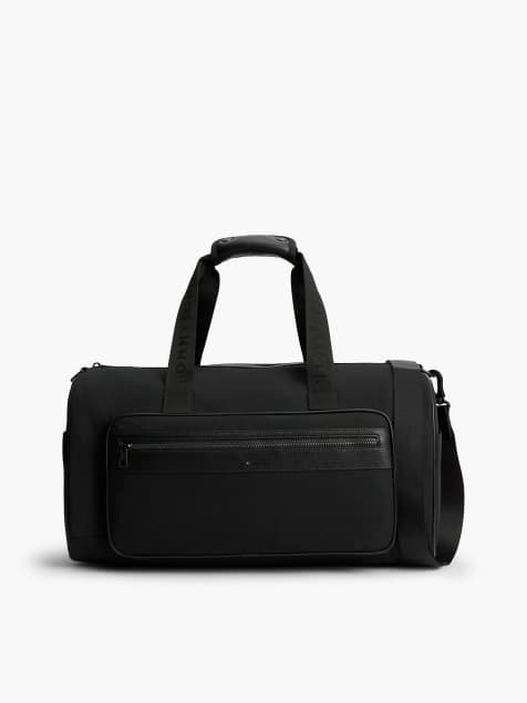 Tommy Hilfiger – Beuteltasche in Schwarz mit Logo und Strukturmix - view 1