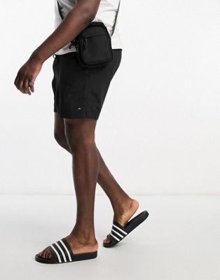 Tommy Hilfiger Big & Tall medium drawstring swim shorts in black - ASOS Price Checker