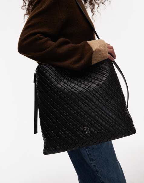 Tommy Hilfiger braided bucket bag with adjustable strap in black - view 1