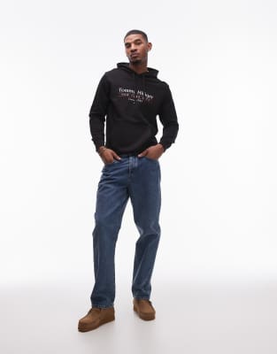 Shop Tommy Hilfiger Center Stack Logo Hoodie In Black