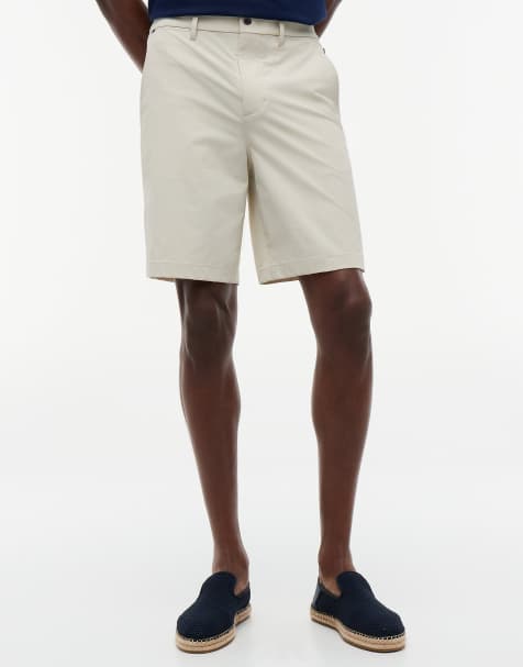 Tommy Hilfiger – Chino-Shorts aus Funktionsmaterial in Beige mit elastischem Bund - view 1
