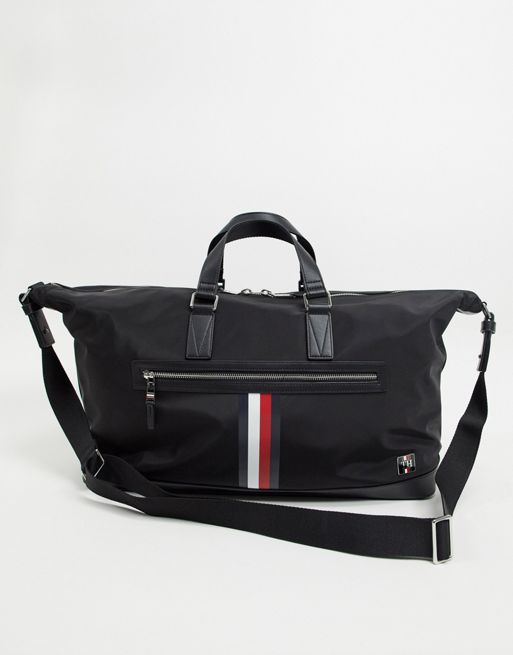 Tommy Hilfiger clean nylon duffle bag with stripe in black | ASOS