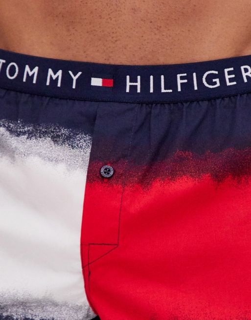 Tommy Hilfiger woven boxer shorts with all over Tommy flag print in navy, ASOS
