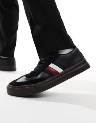 Tommy Hilfiger cupset trainers in black with gum sole