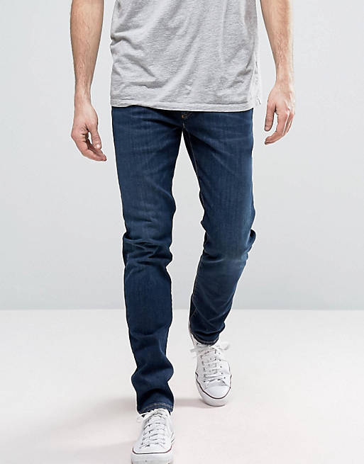 Tommy Hilfiger Denim Simon Skinny Jeans Dynamic Stretch In Dark Wash | ASOS