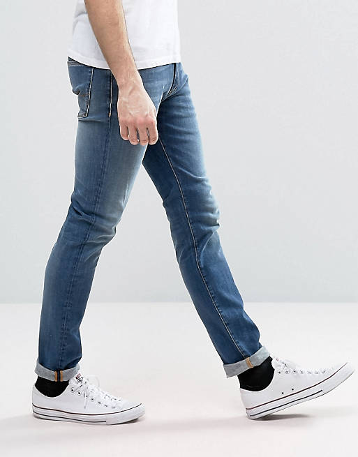 forvridning september historie Tommy Hilfiger Denim Simon Skinny Jeans Dynamic Stretch In True Mid Wash |  ASOS