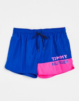 Tommy Hilfiger drawstring swim shorts in blue with contrast pink logo