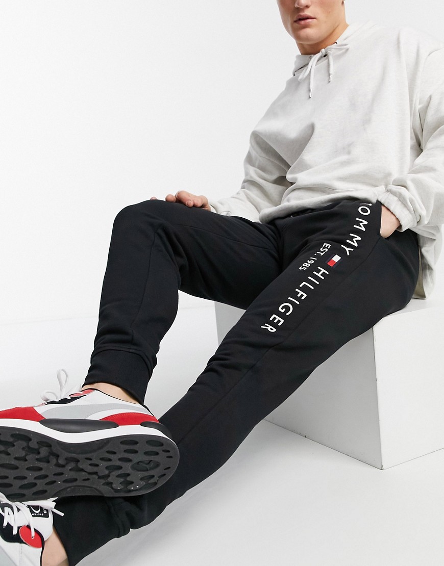 Tommy Hilfiger embroidered logo cuffed joggers in black