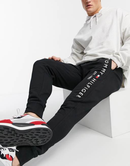 Tommy Hilfiger embroidered logo cuffed joggers in black | ASOS