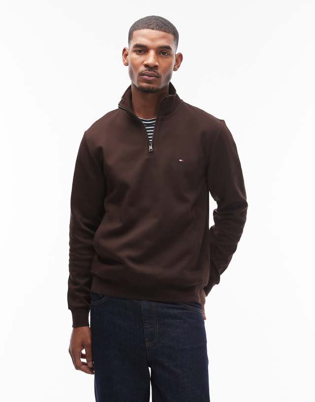 Tommy Hilfiger essential 1/4 zip sweater in chocolate brown | ASOS