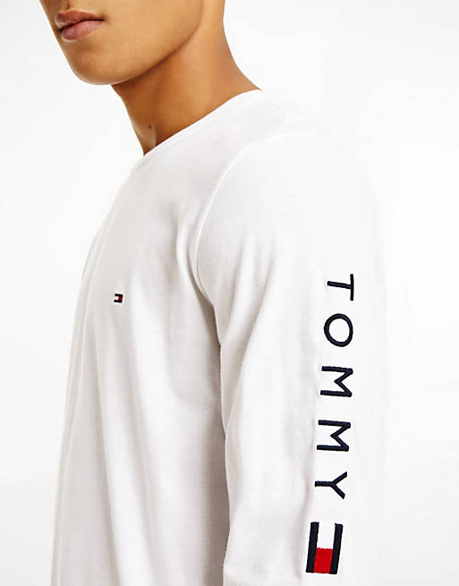 Tommy Hilfiger flag and arm logo long sleeve top in white | ASOS