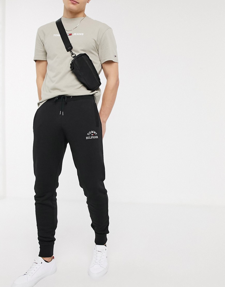 Tommy Hilfiger flag embroidered cuffed joggers in black