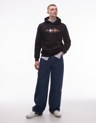 Tommy Hilfiger Embroidered Gold Logo Hoodie In Black