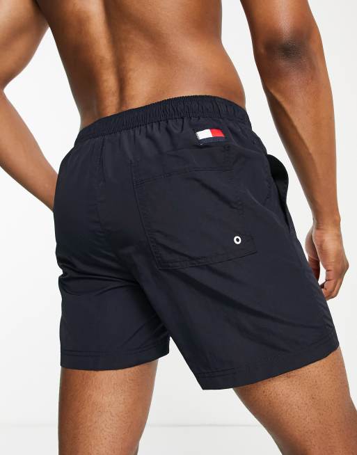 Tommy Hilfiger flag leg logo mid length swim shorts in navy | ASOS