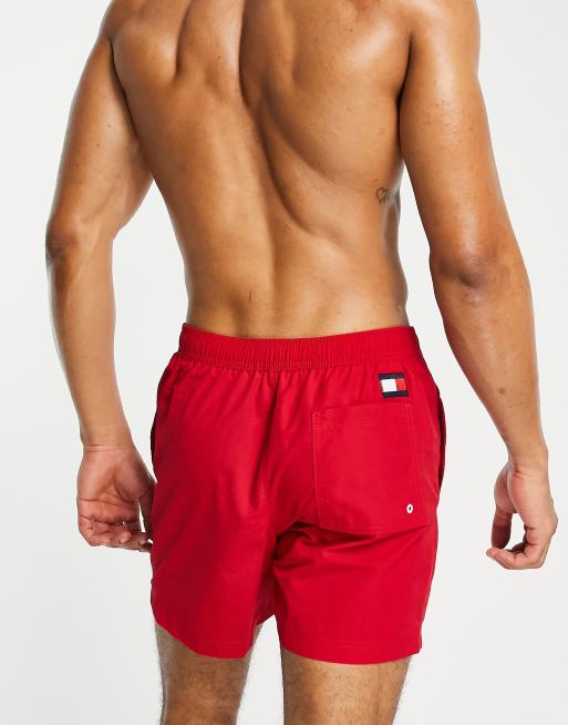 Tommy leg logo mid swim in red | ASOS