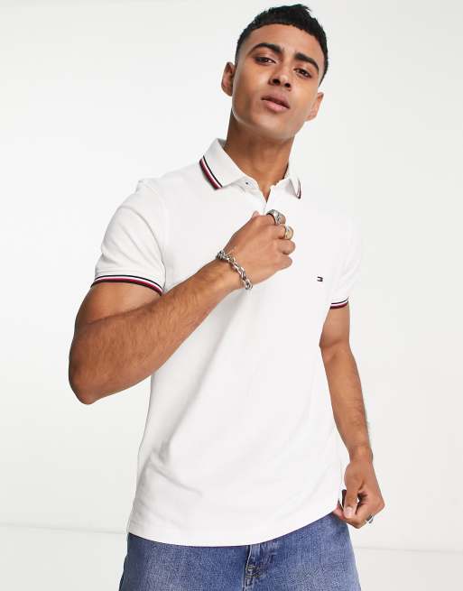 Tommy Hilfiger flag contrast tipped collar pique polo regular fit in white | ASOS