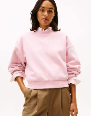 Tommy Hilfiger - Flex - Relaxed-Fit-Sweatshirt aus Fleece in Hellrosa mit Rundhalsausschnitt