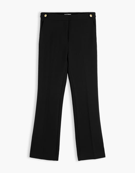 Tommy Hilfiger Gold-tone button slim bootcut trousers in black, 5 of 6