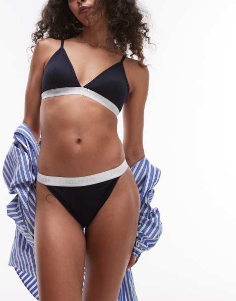 Tommy Hilfiger – Granatowe stringi typu tanga z białą taśmą z logo - view 1