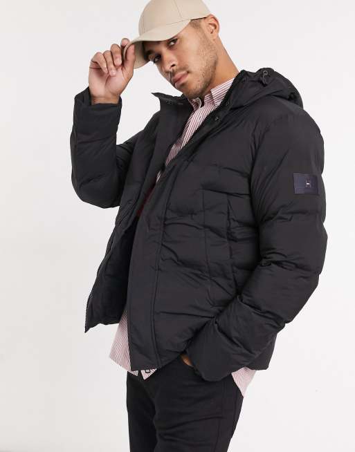 Tommy Hilfiger hooded stretch puffer jacket in black | ASOS