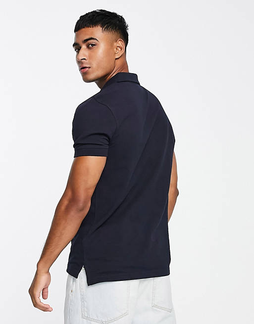 Tommy Hilfiger icon chest stripe pique polo regular fit in navy | ASOS