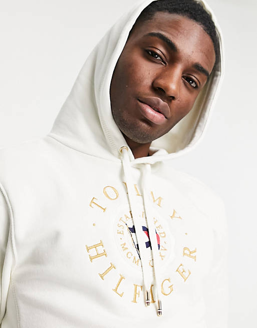 Aquarium Slecht Trots Tommy Hilfiger icon coin logo embroidery hoodie in ivory | ASOS