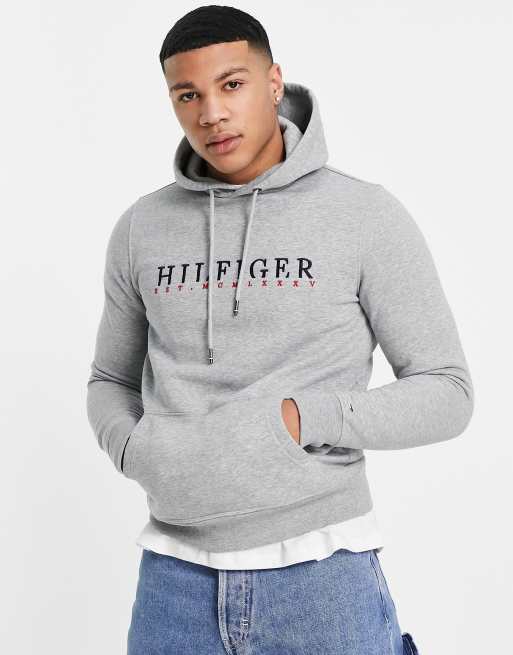 Tommy Hilfiger – Kapuzenpullover in Grau mit Markenlogo-Grafik | ASOS