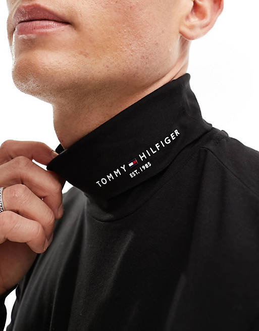 Tommy Hilfiger – Langärmliges Shirt in Schwarz mit Logo am Rollkragen | ASOS
