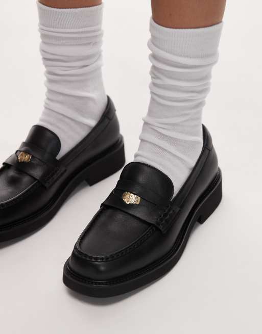 Tommy Hilfiger leather penny loafers in black