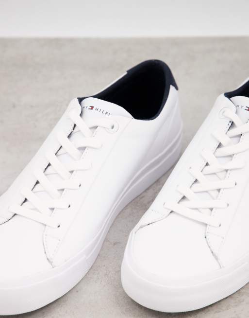 Tommy Hilfiger leather trainer with script logo in white | ASOS