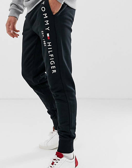 Tommy Hilfiger leg embroidered logo cuffed sweatpants in black | ASOS