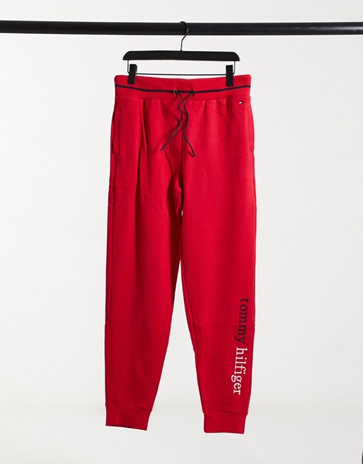Tommy Hilfiger logo lounge joggers in tango red