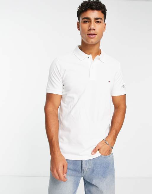 Tommy Hilfiger logo polo shirt in white | ASOS