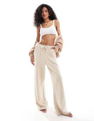 Tommy Hilfiger - Lounge-Hose aus Strick in Beige mit eckigem Logodetail-Neutral