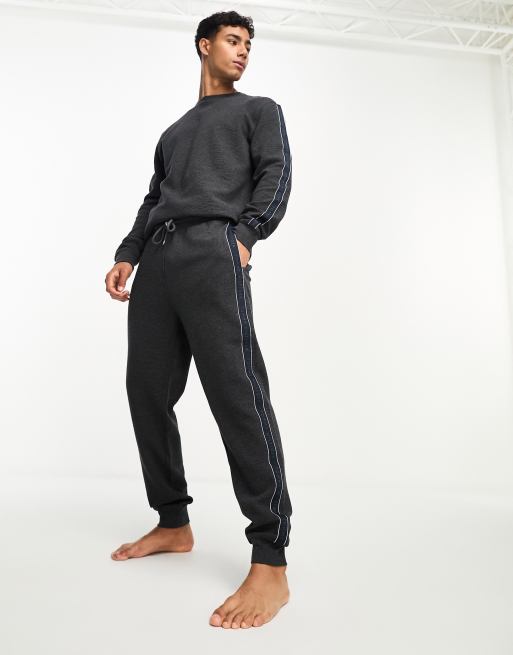 Tommy Hilfiger - Lounge-joggingbroek met logo en logobies in grijs
