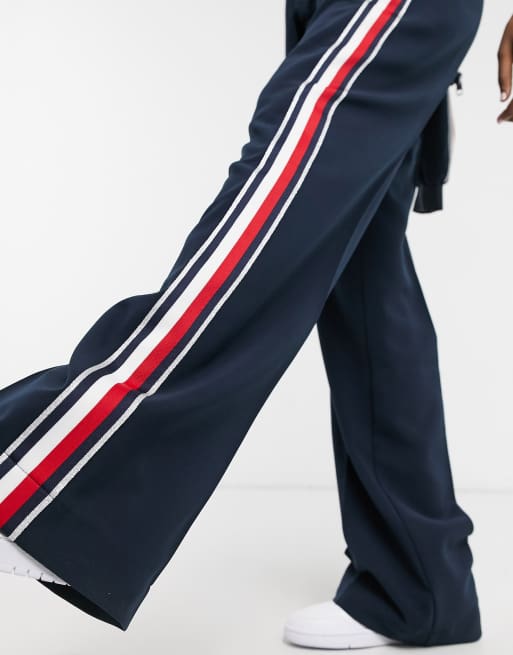 Tommy Hilfiger – Marinblå mjukisbyxor med ränder i sidan, 2 av 4