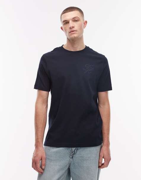 Tommy Hilfiger - Marineblå T-shirt med tekstlogo og interlock-syninger - view 1