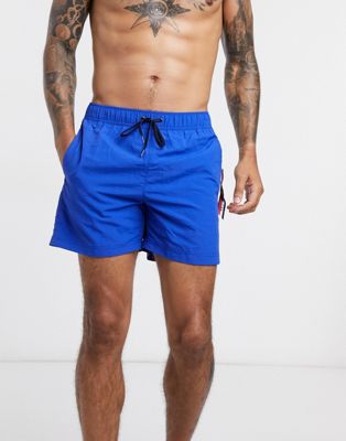 Tommy Hilfiger medium drawstring swim shorts | ASOS
