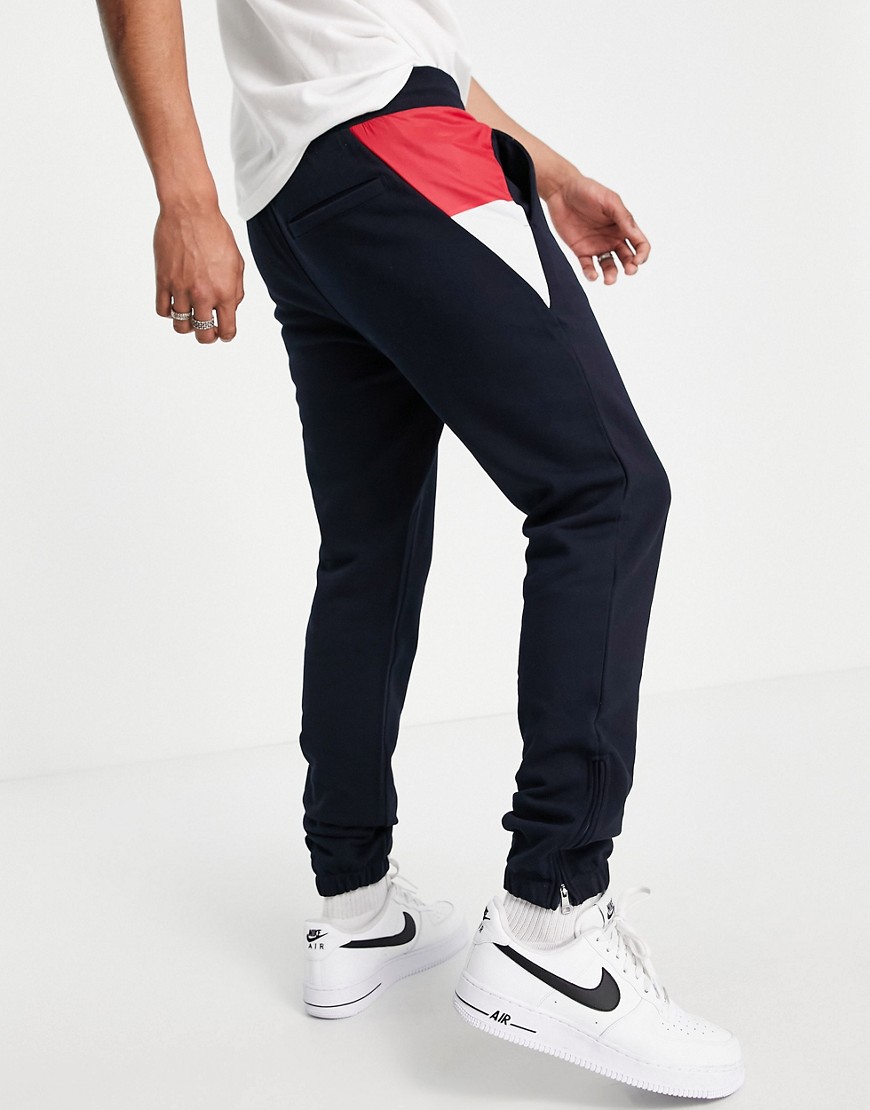 Tommy Hilfiger mix media color block cuffed sweatpants in desert sky navy