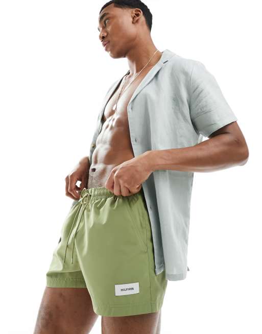 Tommy Hilfiger monotype short drawstring label swim shorts in olive